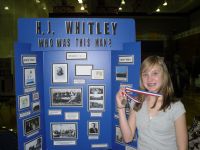 Abi holding her medal.